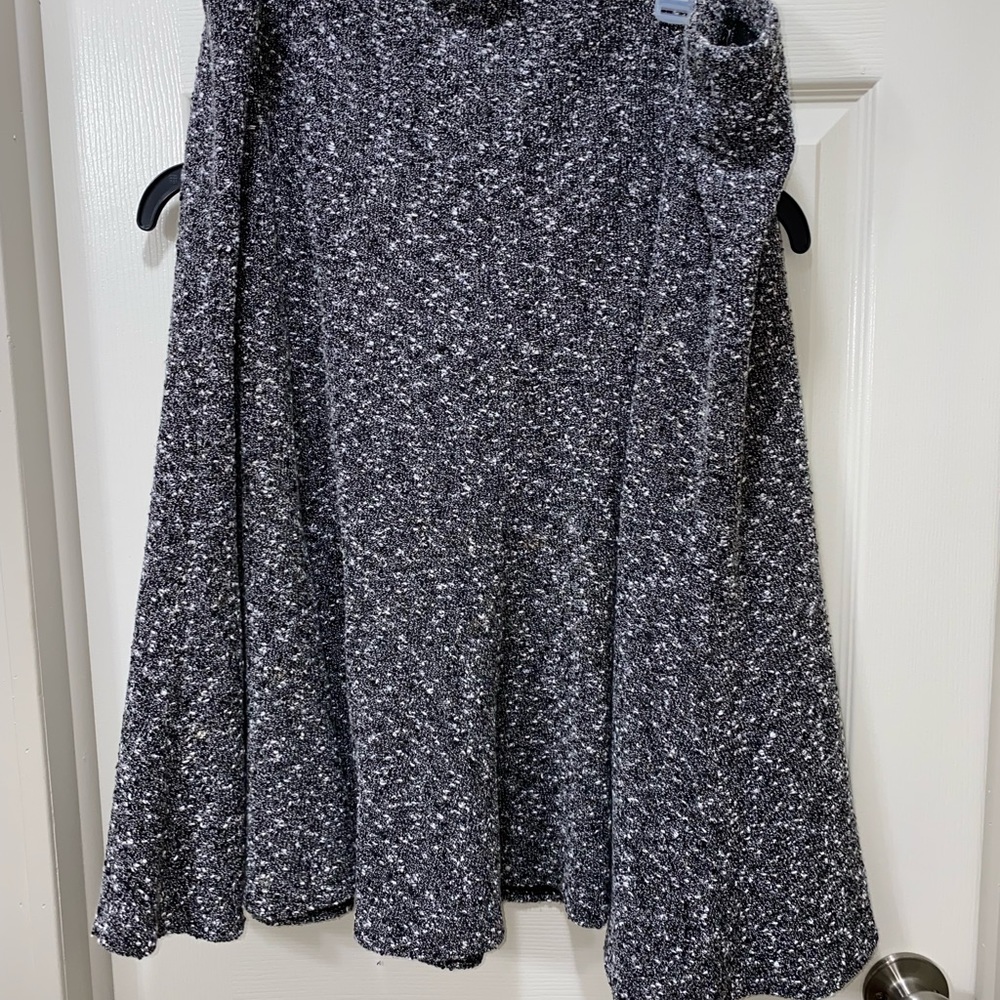 Thick, gray, business casual knee length shirt.